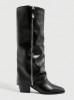 Bottes noires hautes à bout pointu et talon épais, style cavalière sexy