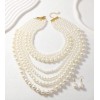 Collier Multi-Rangs de Perles – Élégance Intemporelle