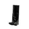 BOTTES HAUTES À RIVETS – MUST-HAVE TENDANCE 2025 POUR UNE GARDE-ROBE STYLÉE