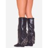 BOTTES HAUTES À RIVETS – MUST-HAVE TENDANCE 2025 POUR UNE GARDE-ROBE STYLÉE