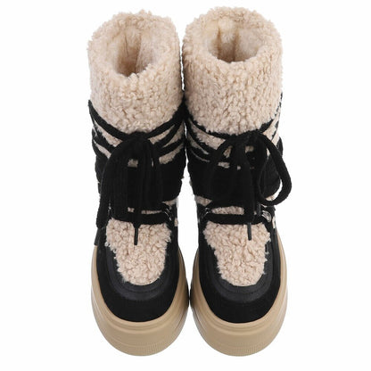 BOTTINES FEMME NOIRES FOURRÉES À LACETS – SEMELLE PLATEFORME CRANTÉE ET COL BOUCLETTE