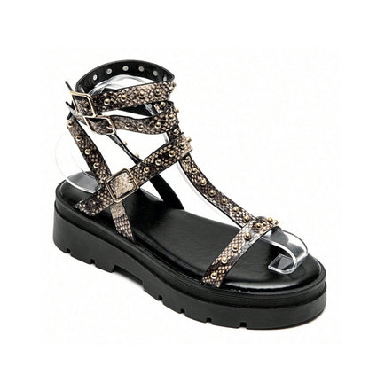 Sandales gladiateurs cloutée à platform miss Glita serpent snake print