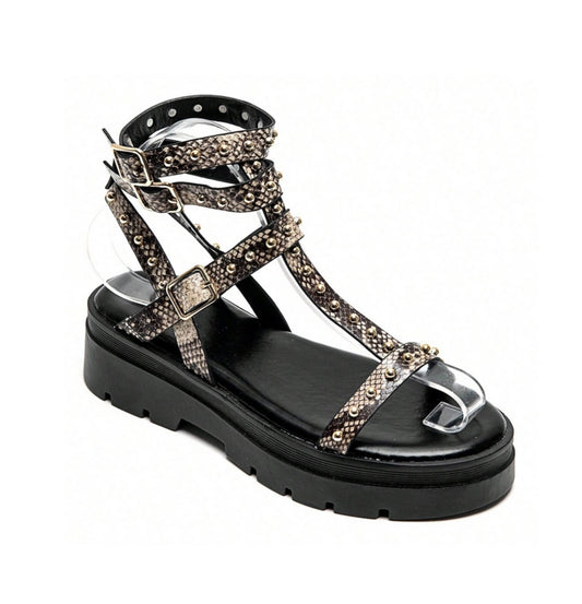 Sandales gladiateurs cloutée à platform miss Glita serpent snake print
