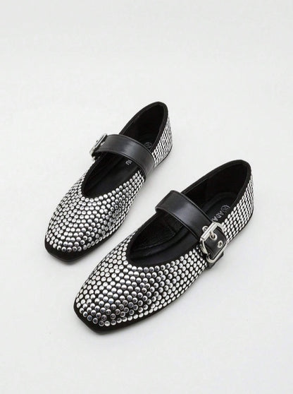 Ballerines cloutées noir et argent