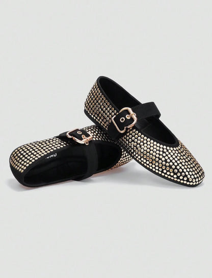 Ballerines cloutées noir et or