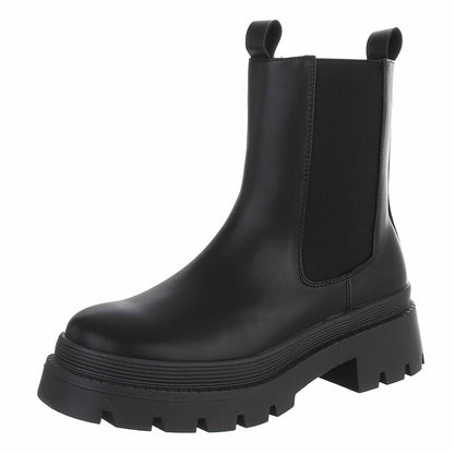 BOTTES CHELSEA NOIRES ASPECT CUIR LISSE – SEMELLE CRANTÉE PLATEFORME MISS AUDRINA